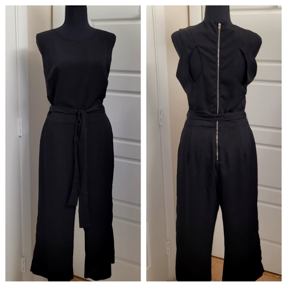 Bebe black capri length romper
